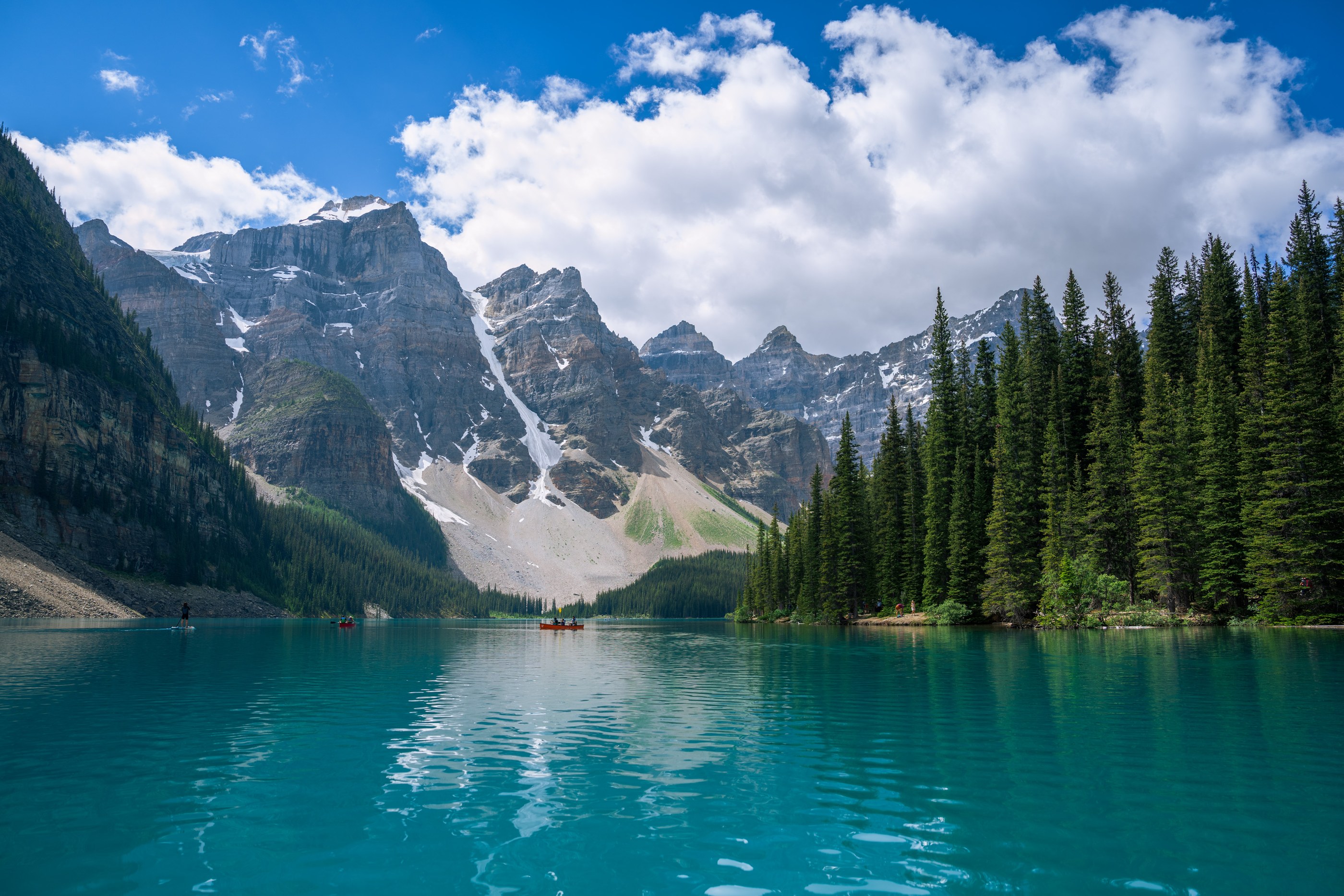 Turquoise water beneath the mountains at Moraine Lake.